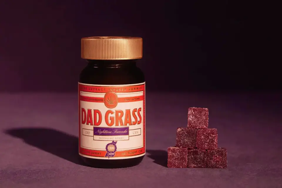 Soft chew joint supplement pieces next to their product label on a kitchen counter