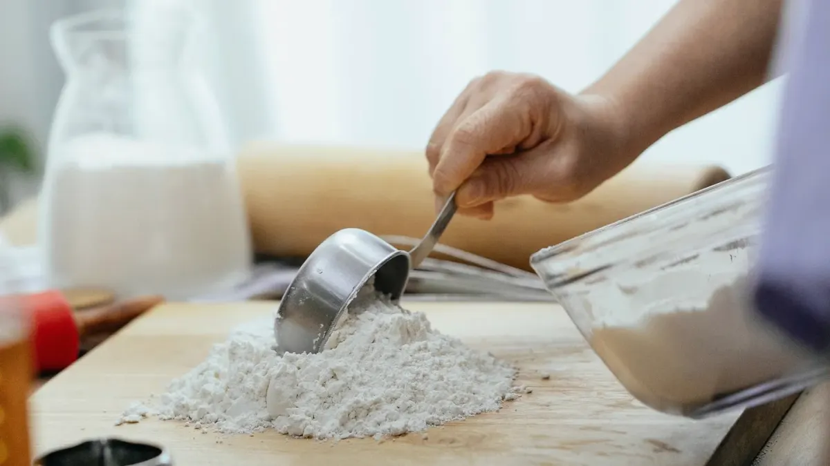 Two open supplement containers, one powder and one freeze-dried, sitting on a kitchen counter